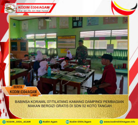 BABINSA KORAMIL 07/TILATANG KAMANG DAMPINGI PEMBAGIAN MAKAN BERGIZI GRATIS DI SDN 02 KOTO TANGAH