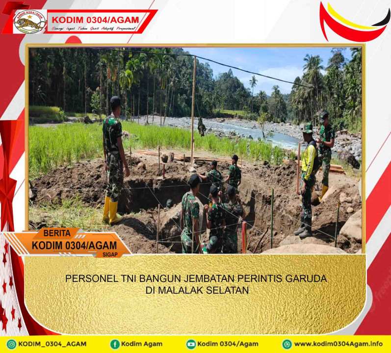 PERSONEL TNI BANGUN JEMBATAN PERINTIS GARUDA DI MALALAK SELATAN